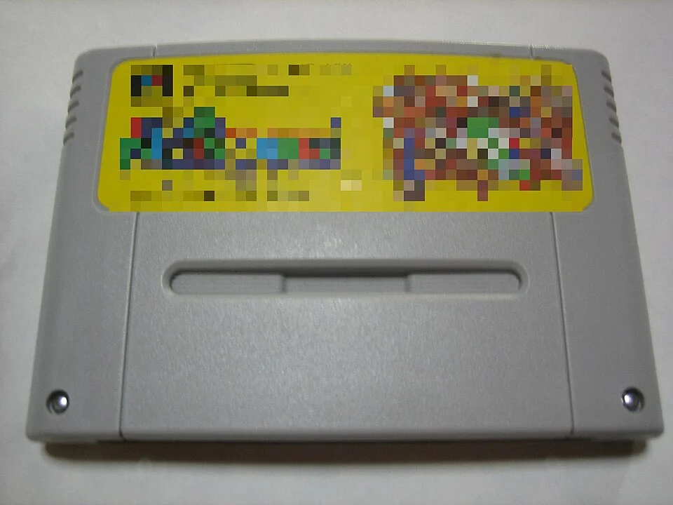 Super Famicom cartridge with the label of "Super Mario World" (Pixelated).